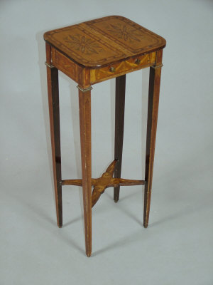 Appraisal: A mahogany and satin birch inlaid occassional table circa with