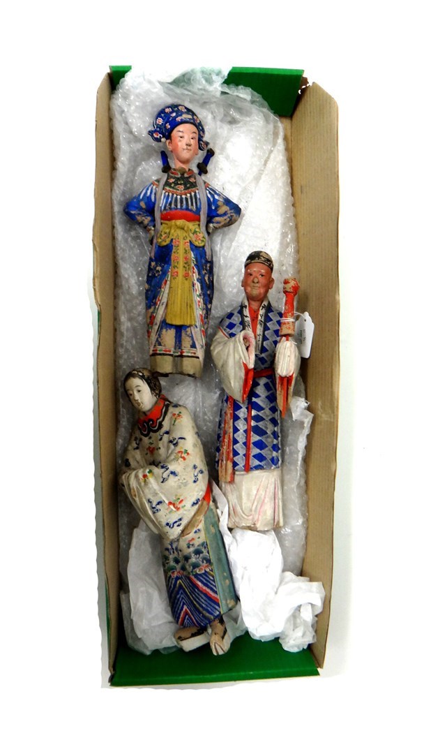 Appraisal: Three Chinese export polychrome decorated clay nodding head figures th