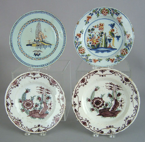 Appraisal: Four Delft plates mid th c with polychrome decoration dia