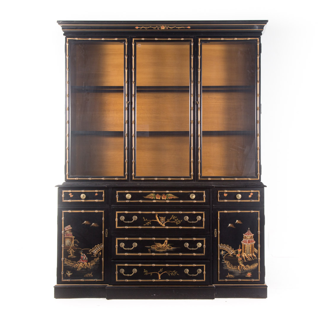 Appraisal: Chinese style ebonized breakfront cabinet th century molded cornice upper