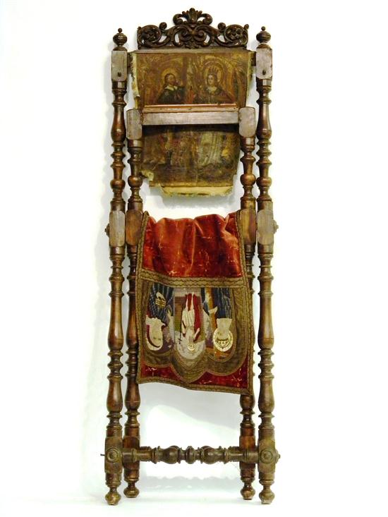 Appraisal: Renaissance style stand carved crest turned supports decorated leather mount