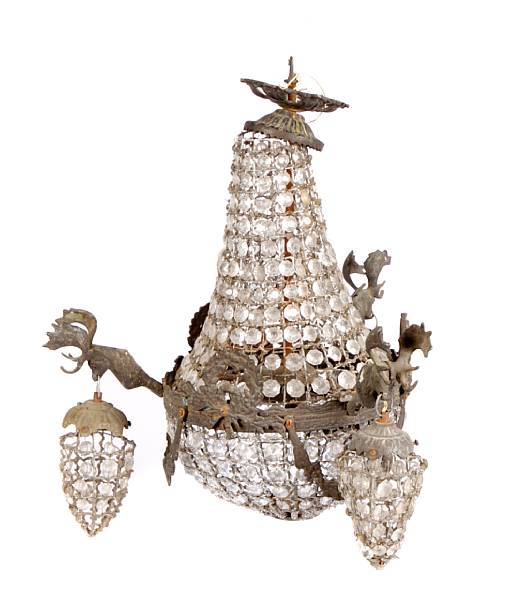 Appraisal: A pair of bronze and crystal three light chandeliers height