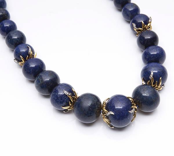 Appraisal: A lapis lazuli and diamond bead necklace composed of large