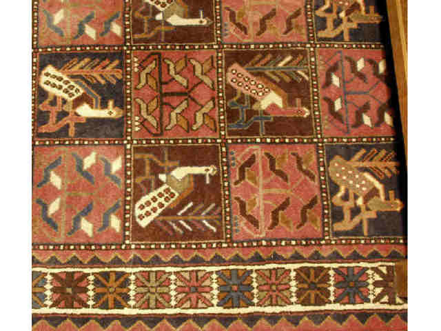 Appraisal: Hand woven tribal Persian carpet measuring ' X ' Showing