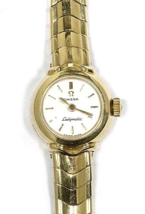 Appraisal: LADY'S WRISTWATCH OMEGA LADYMATIC s Yellow gold Round case No