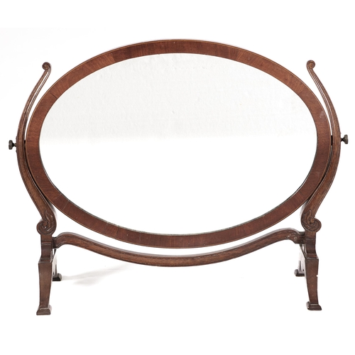 Appraisal: An oval mahogany dressing mirror early th c cm h