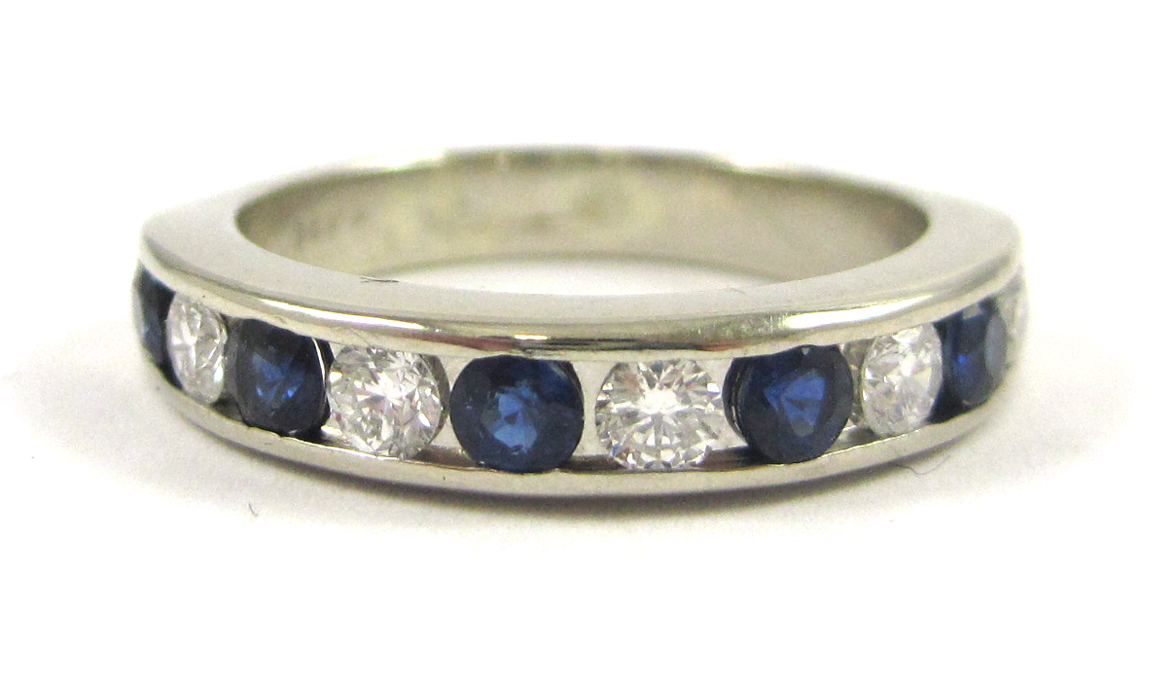 Appraisal: SAPPHIRE DIAMOND AND FOURTEEN KARAT GOLD RING The white gold