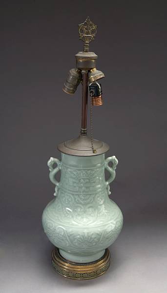 Appraisal: A Chinese celadon porcelain vase th century Molded in the