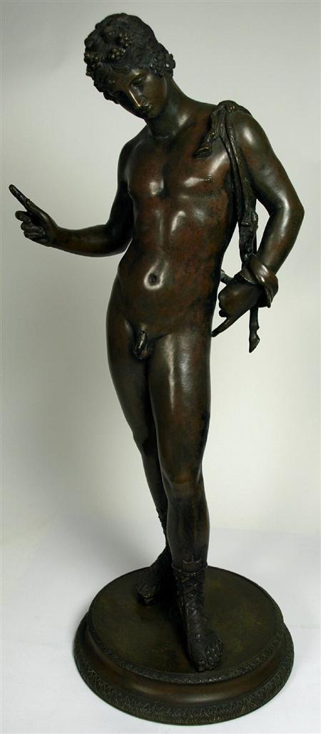 Appraisal: AFTER THE ANTIQUE NARCISSUS bronze with green patination the standing