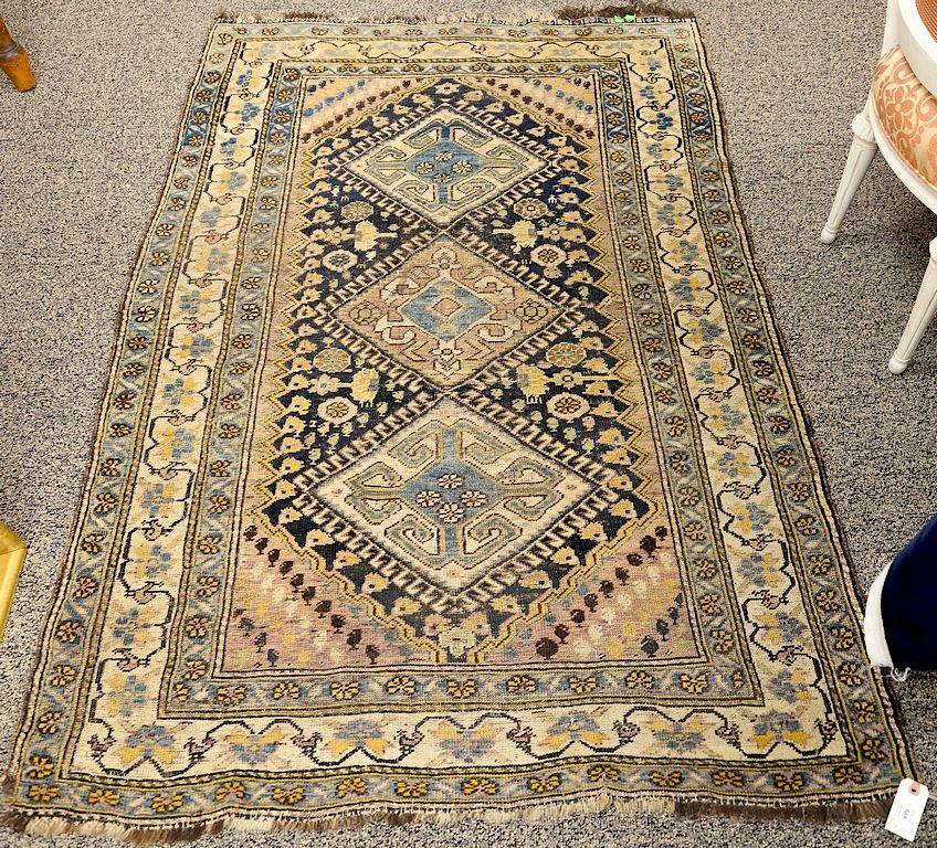 Appraisal: Two Caucasian Oriental throw rugs ' x ' and '