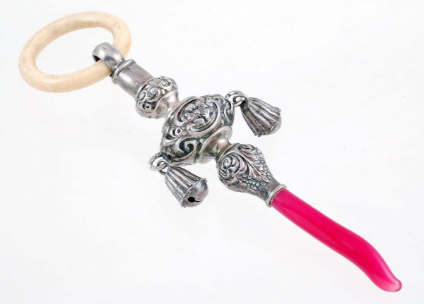 Appraisal: Victorian baby rattle Sterling silver body with repousse scrolling Hallmarked