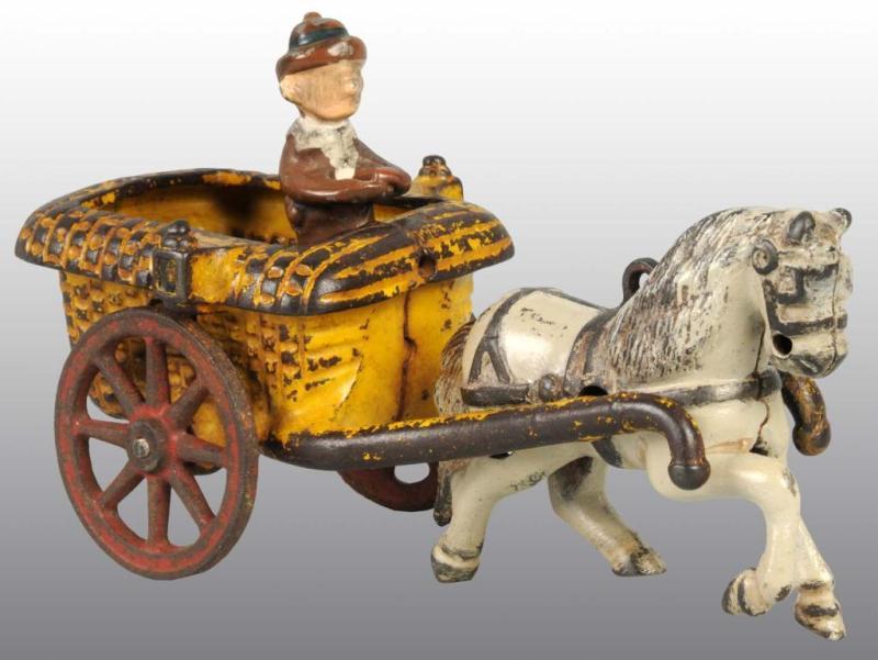 Appraisal: Cast Iron Arcade Chester Dump Cart Description Figure is replaced