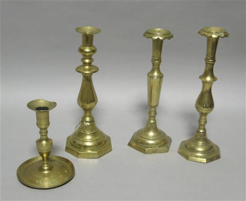 Appraisal: FOUR BRASS CANDLESTICKS Of four different forms