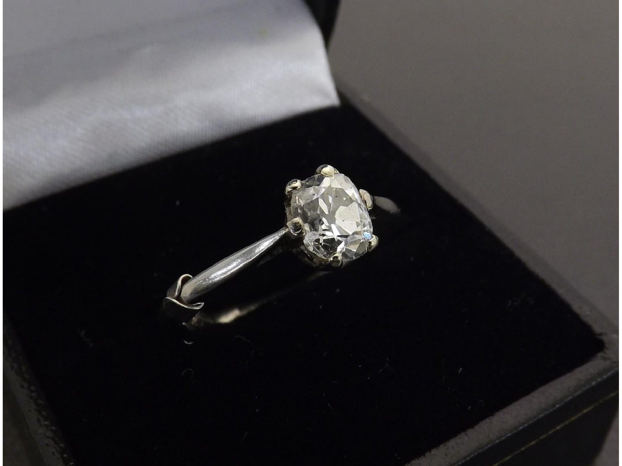 Appraisal: Good platinum old-cushion-cut diamond solitaire ring ct approx clarity SI