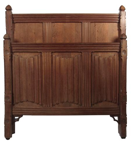 Appraisal: A Victorian Gothic revival oak bed the head and foot