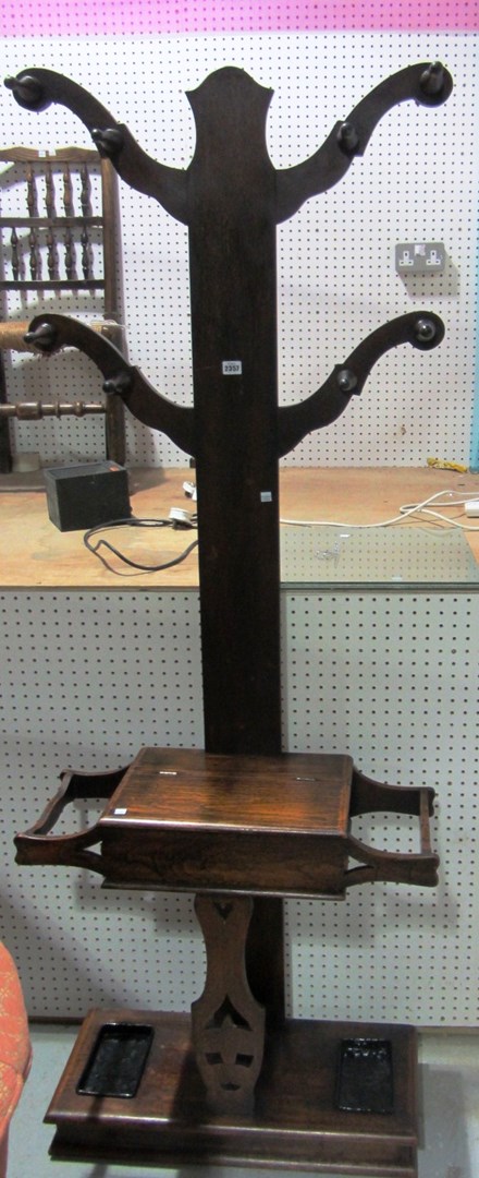 Appraisal: A th century faux oak three hook hall stand with