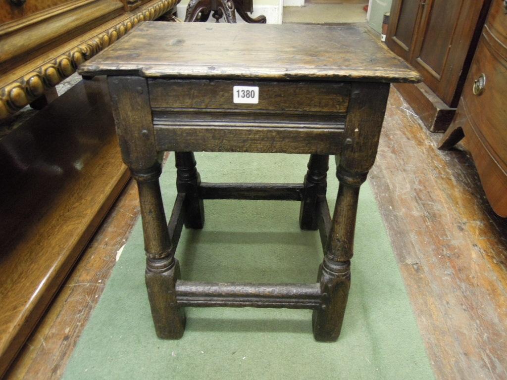 Appraisal: An old English style oak joint stool with rectangular seat