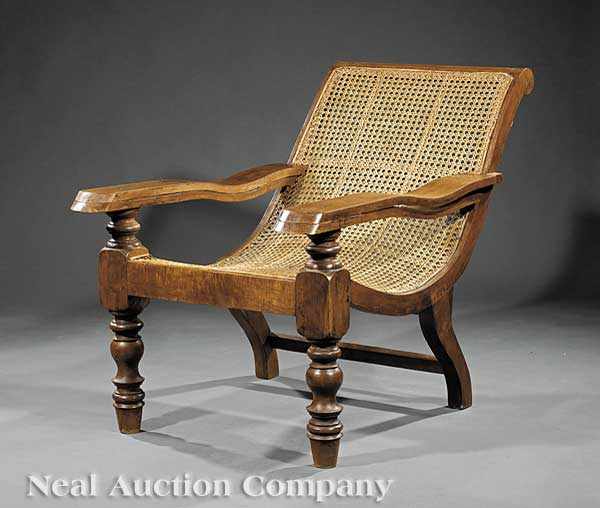 Appraisal: A West Indies Mahogany Planter's Chair th c caned back