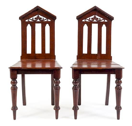 Appraisal: A Pair of Regency Style Grain-Painted Hall Chairs Height inches