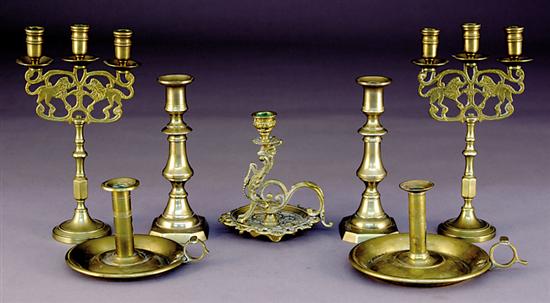 Appraisal: Seven brass candlesticks th century pair of push-up design H