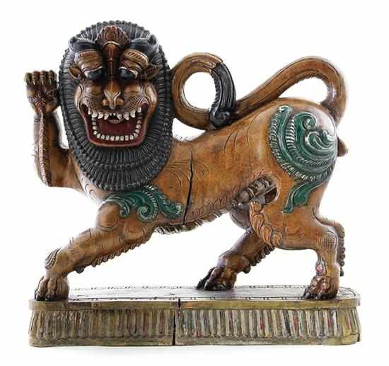 Appraisal: Thai painted and carved wood lion standing full figure with