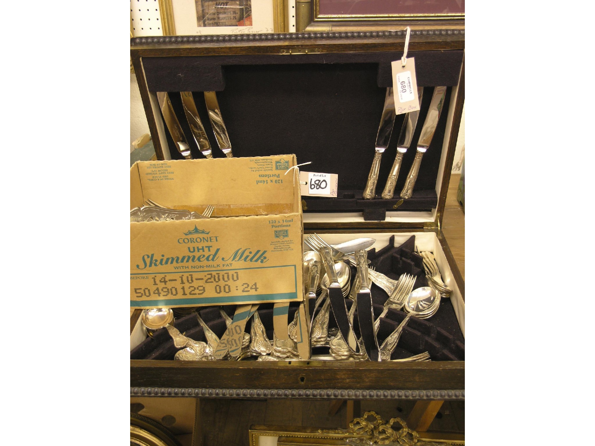 Appraisal: A dark oak canteen Queen's pattern cutlery and an assortment