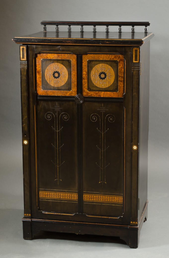 Appraisal: ENGLISH AESTHETIC MOVEMENT MUSIC CABINET H Ogden Son Furniture Maker