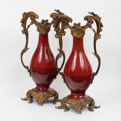 Appraisal: A pair of th Century gilt metal mounted vases perhaps