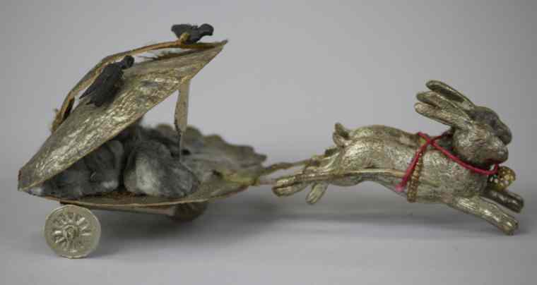 Appraisal: DRESDEN OYSTER SHELL CHARIOT PULLED BY RABBITS German Dresden ornament