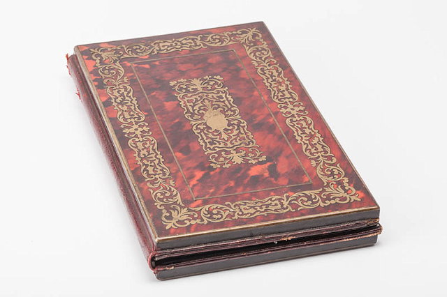 Appraisal: A RED TORTOISESHELL AND BOULLE MOUNTED CORRESPONDENCE CASE with blotter