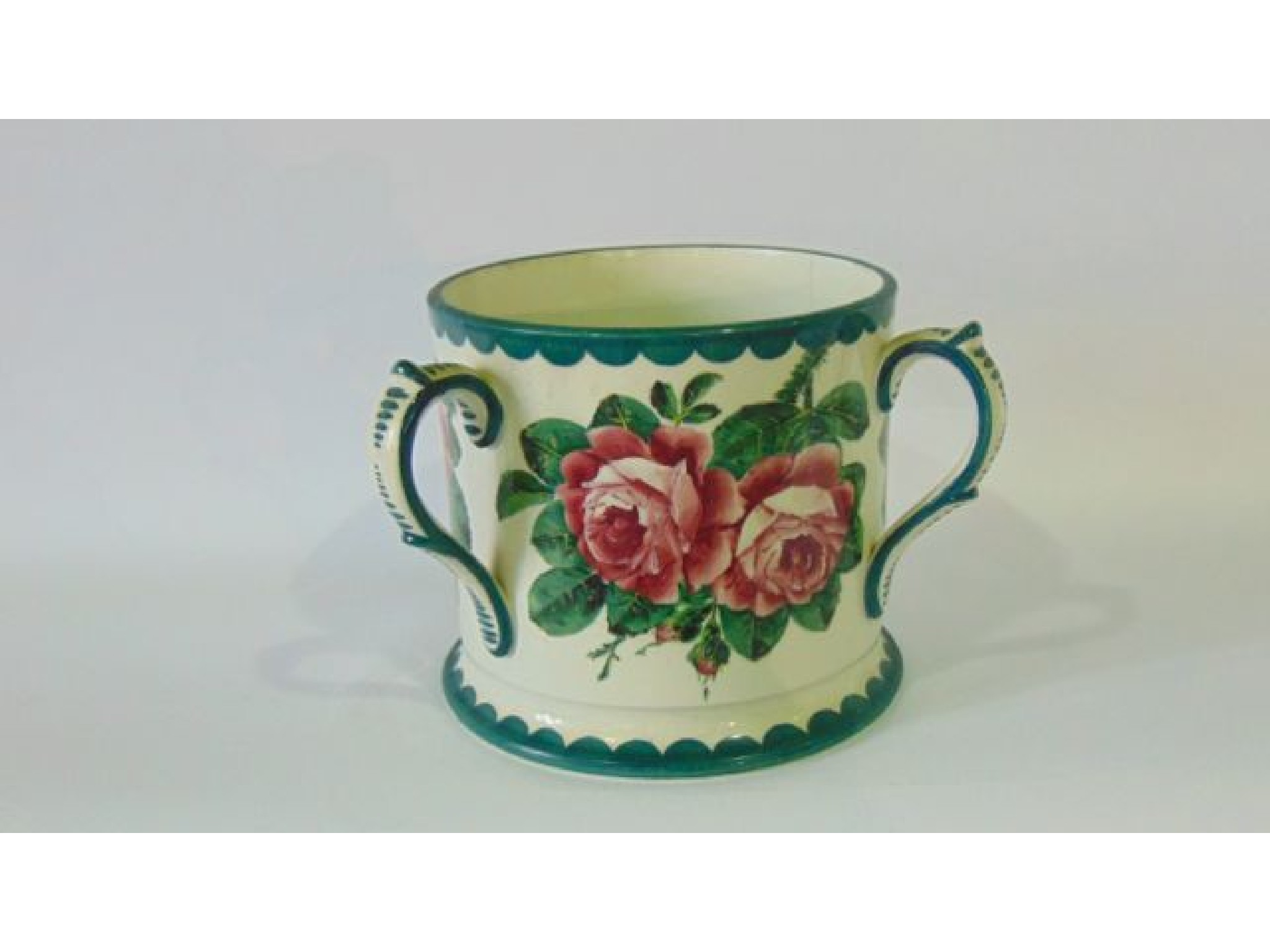 Appraisal: A large Wemyss tyg with painted pink rose decoration and