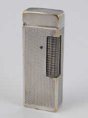 Appraisal: A silver plated Dunhill gas lighter