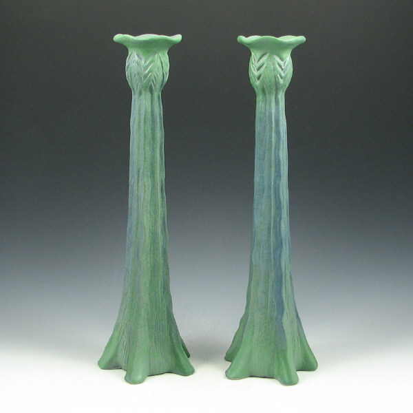 Appraisal: Pair of Tim Eberhardt matte green candlesticks or bud vases