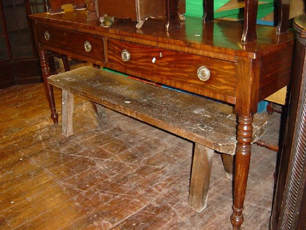 Appraisal: A th century mahogany side serving table of rectangular form