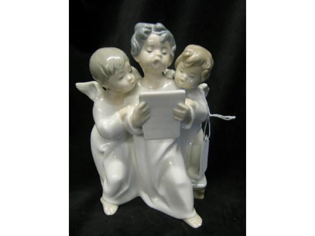 Appraisal: Lladro Figurine Group of Angels a singing trio tall excellent