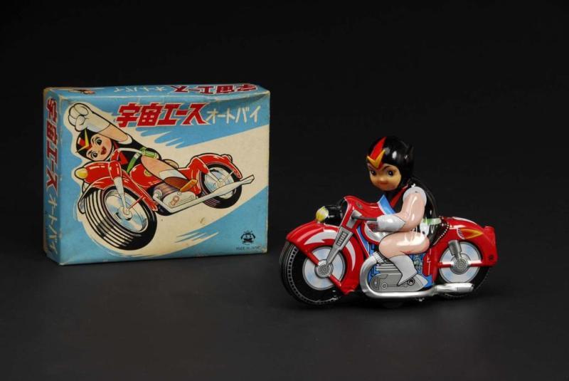 Appraisal: Space Ace on Motorcycle Toy Description Japanese Made by Osakusa