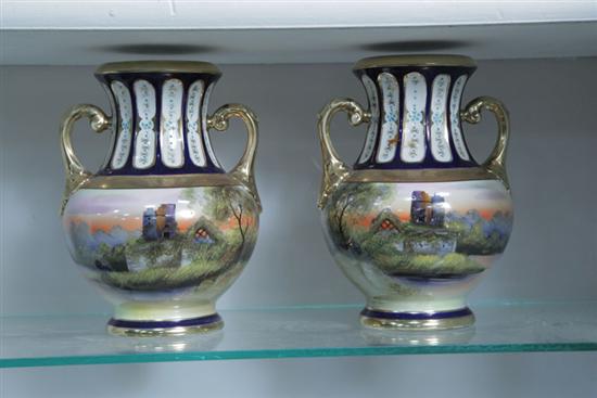 Appraisal: PAIR OF NORITAKE URNS Porcelain urns decorated with handpainted landscapes