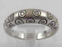 Appraisal: An unusual hallmarked ct white gold enamelled diamond ring