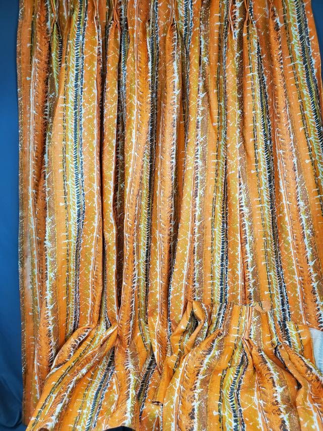 Appraisal: Pair of vintage funky orange curtains pleated at the top