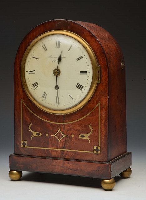 Appraisal: A REGENCY MAHOGANY AND BRASS INLAID MANTEL TIMEPIECE by Barwise