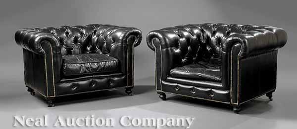 Appraisal: A Pair of Black Leather Club Chairs scroll arms continuous