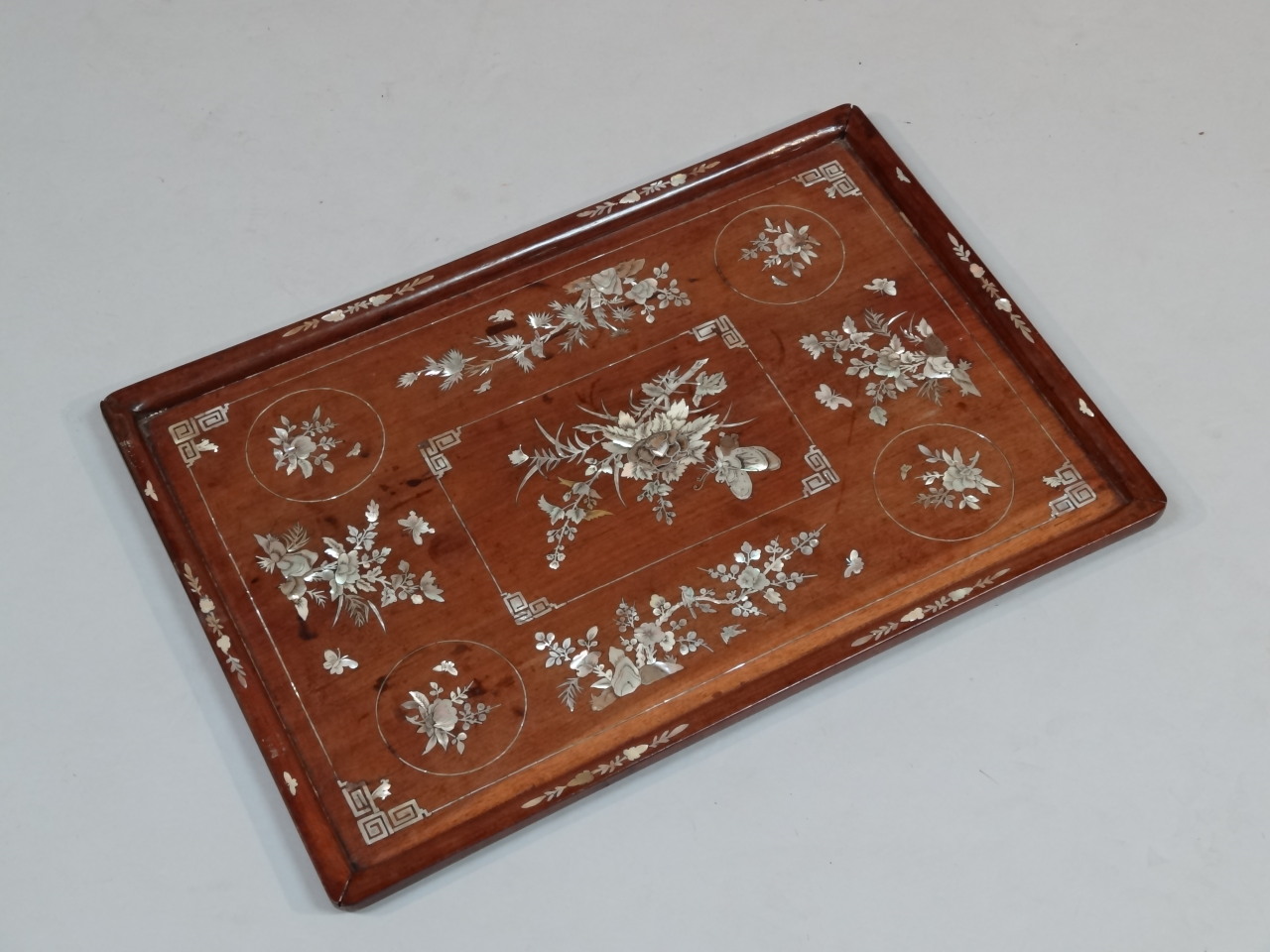 Appraisal: A thC Japanese serving tray with a galleried edge set