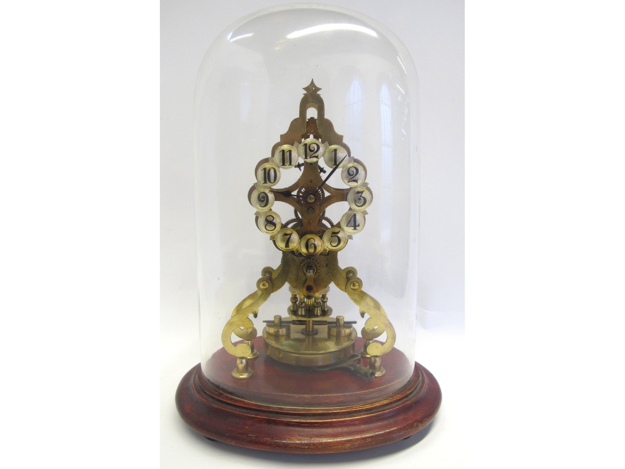 Appraisal: Gilt metal clock with glass dome