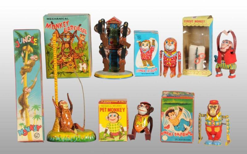 Appraisal: Lot of Tin Monkey Wind-Up Toys Description Japanese Post-war Working