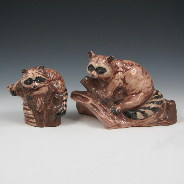 Appraisal: Wisecarver Raccoon Figures Two Set of two Rick Wisecarver raccoons