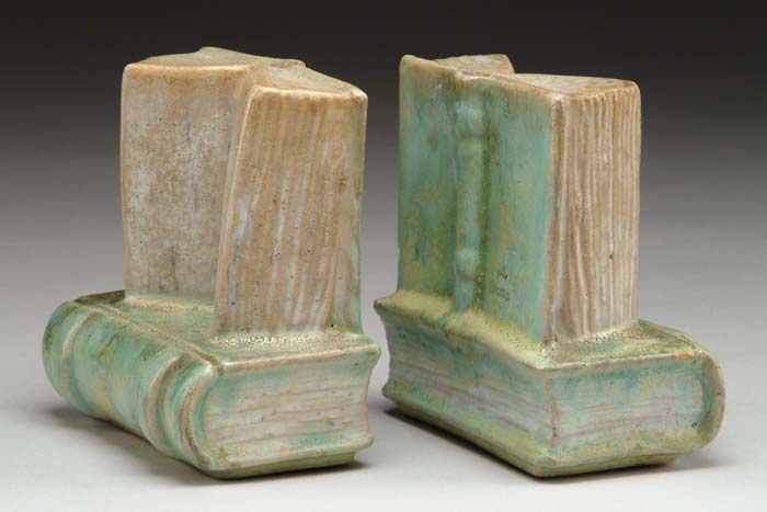 Appraisal: SIGNED PAIR OF FULPER BOOK DESIGN BOOKENDS Heavy mottled green