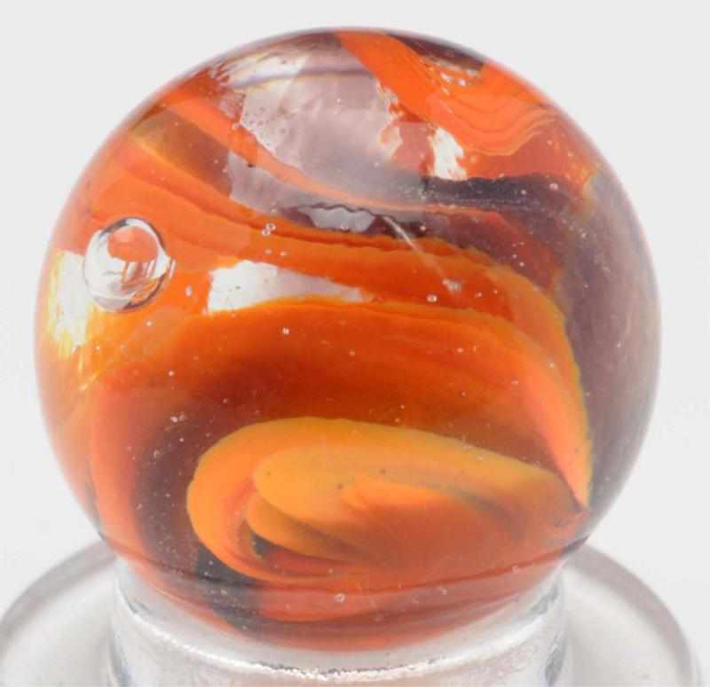 Appraisal: Christensen Agate Cyclone Marble Clear base with orange and black