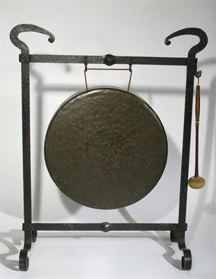 Appraisal: A wrought iron and bronze gong unmarked cm high