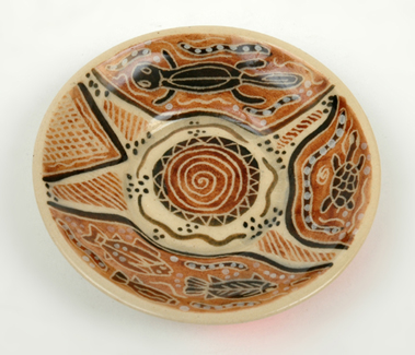 Appraisal: CARL COOPER Victoria circa Circular earthenware dish decorated with indigenous