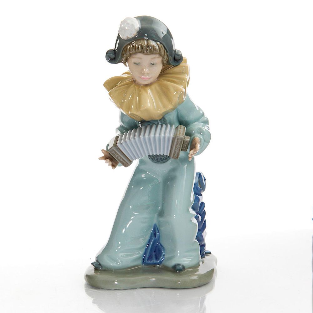 Appraisal: NAO BY LLADRO FIGURINE CLOWN WITH ACCORDION Young boy in